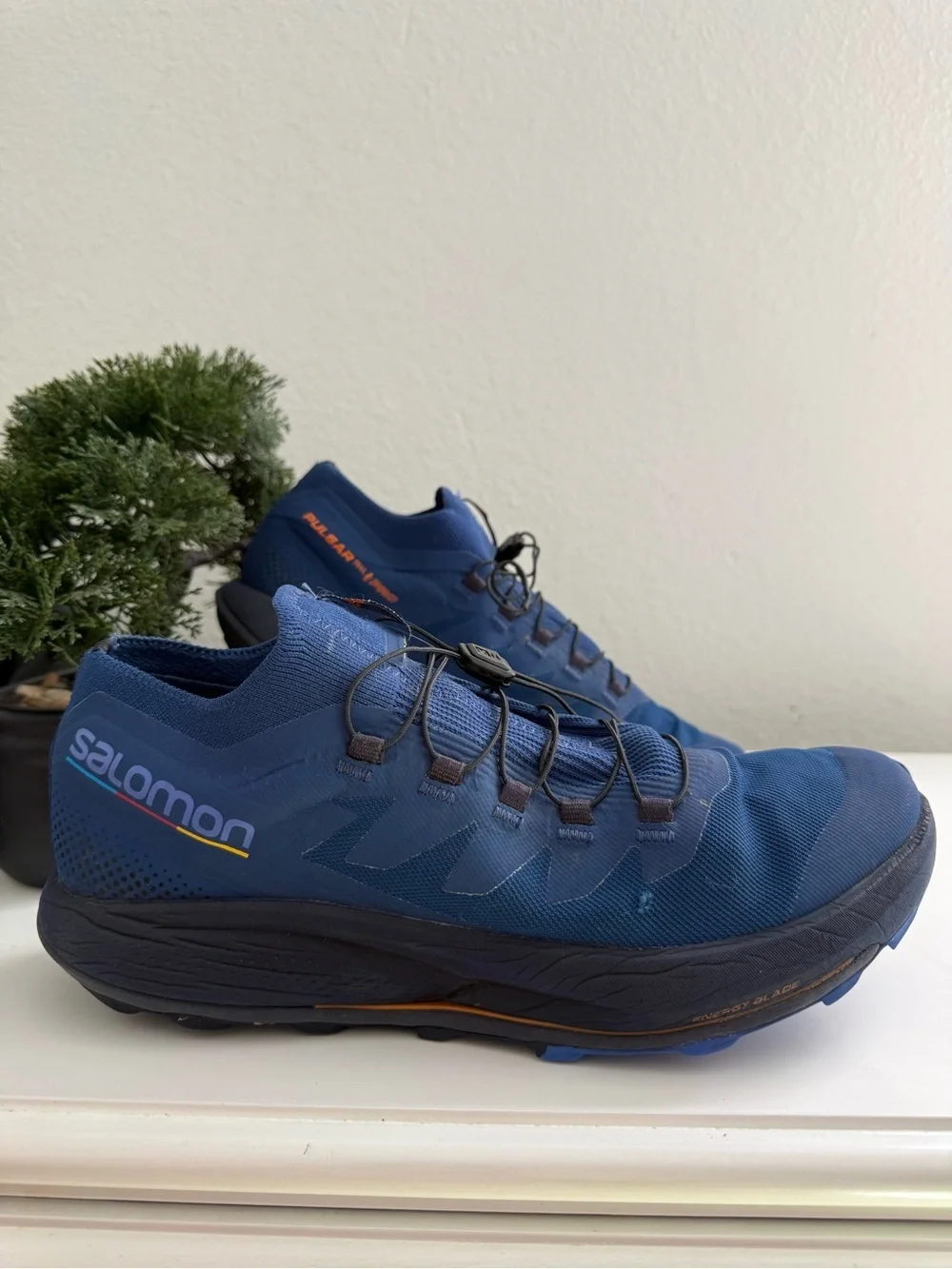 Salomon pulsar trail pro Men size 10.5 Blue Trail Runner with Orange Accents